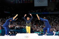 | Photo: AP/Abbie Parr : Simone Biles and Jordan Chiles bow to gold medalist Rebeca Andrade 